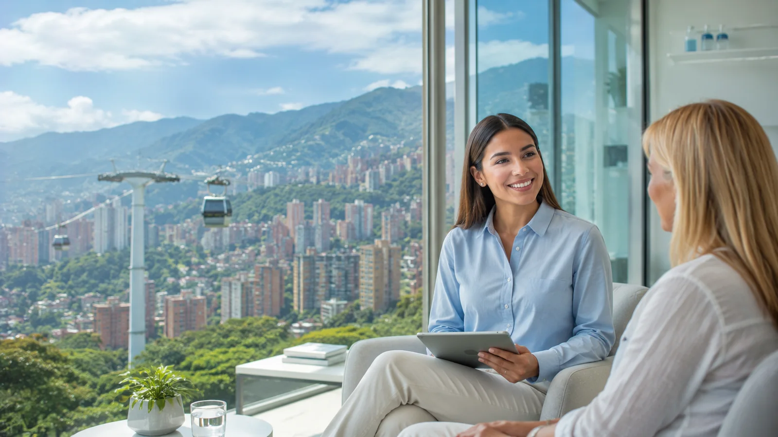 HealthBridge bilingual patient advisor with an international patient and the Medellín skyline